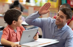 man high-fiving kid