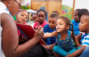 woman reading to children